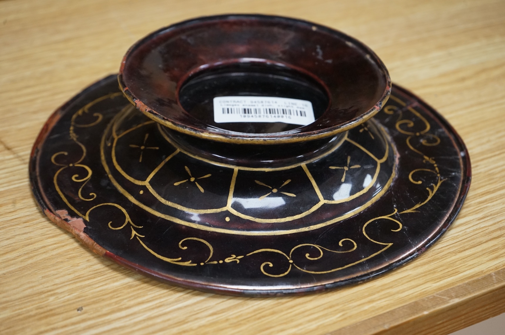 A Limoges style enamel on copper dish, decorated with a portrait of a gentleman in profile, 22cm in diameter